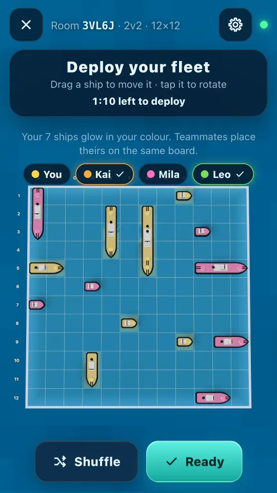 Placing a team fleet: your yellow ships and a teammate's pink ships share one board.